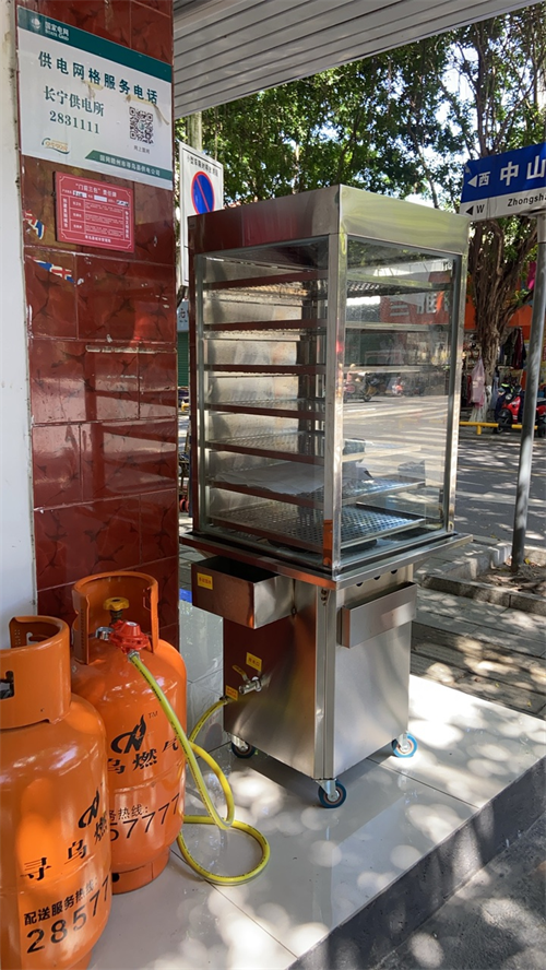 石田心十字路口，带轮带斗蒸炉，7层冲孔蒸包柜